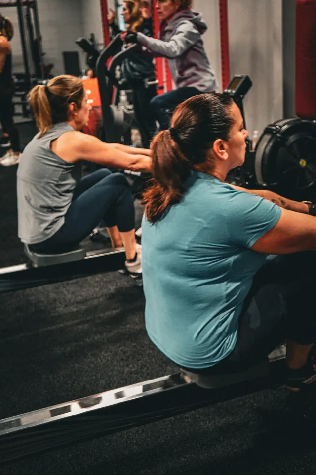 Two members doing seated rows at Visualize Fitness