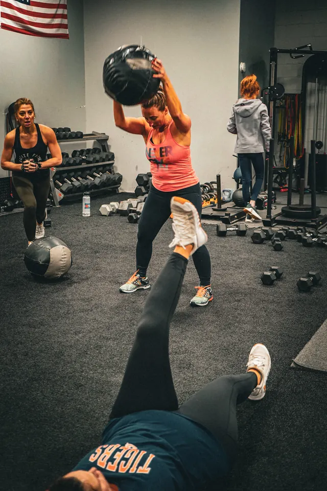 Members doing a medicine-ball workout at Visualize Fitness